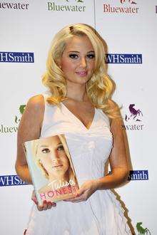 X-Factor judge Tulisa Contostavlos met hoards of fans when she held a book signing at Bluewater.
