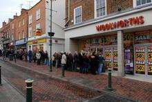 Shoppers queued outside the Woolworths branch in Sittingbourne when its closure was announced