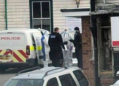 Police and forensics at the scene in Station Road, Lyminge