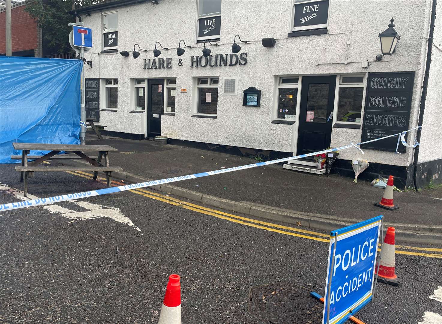 The pub is still cordoned off while police investigate