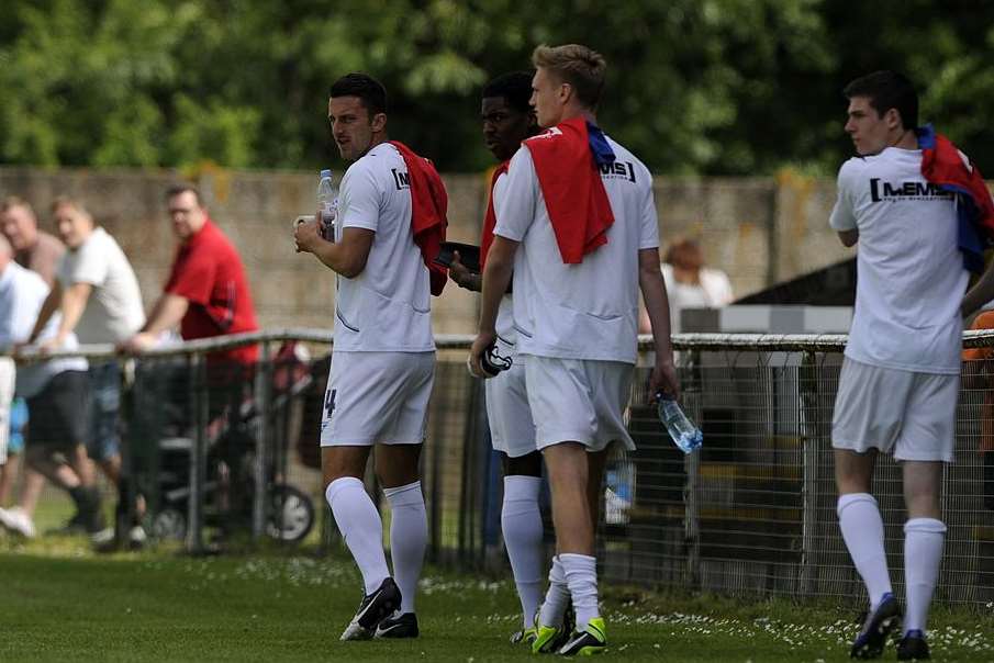 Chris Whelpdale, far left, leads out a youthful second half Gills side for their warm-up at Ashford Picture: Barry Goodwin