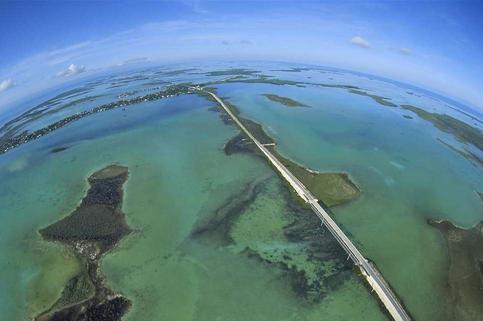 Garden Route: The Florida Keys' Overseas Highway US1 as it bisects the Atlantic Ocean, left, and the Gulf of Mexico, right, in the Lower Keys. Photo: Andy Newman/Florida Keys News Bureau