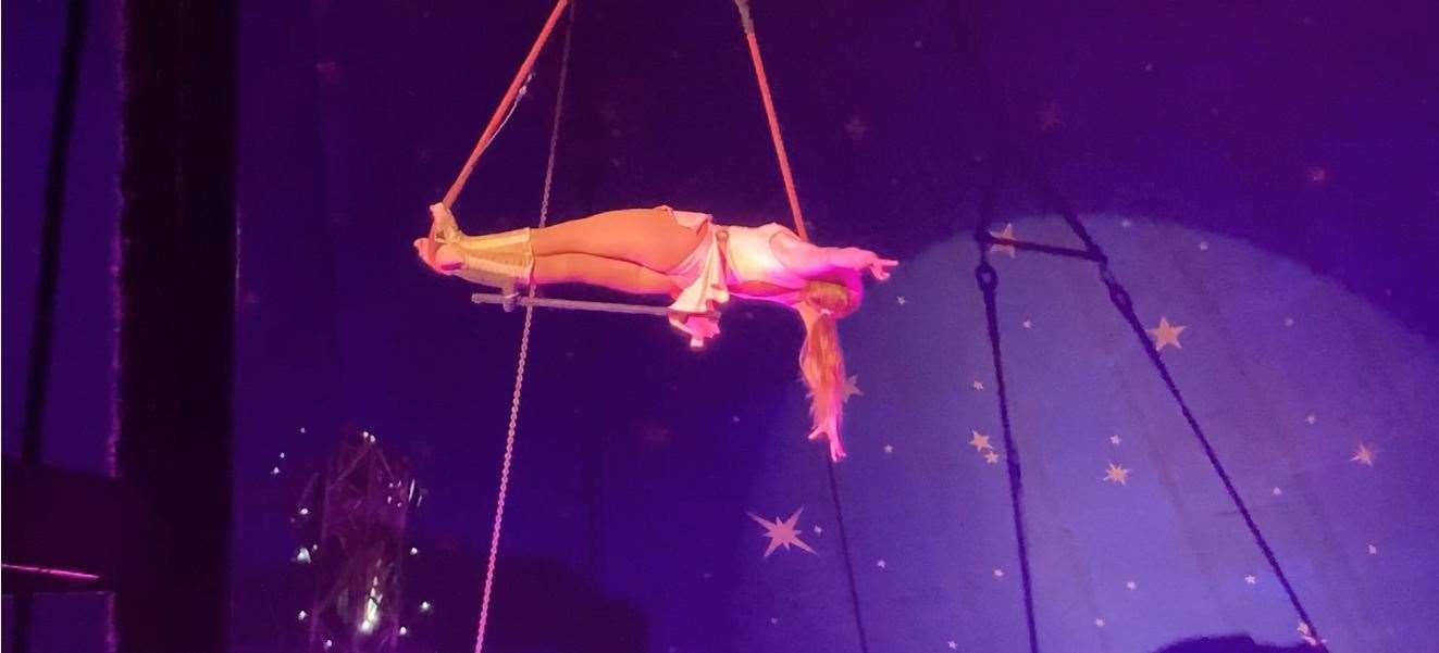Trapeze artiste Megan Christian performing in the Santus Circus Big Top at Barton's Point Coastal Park, Sheerness