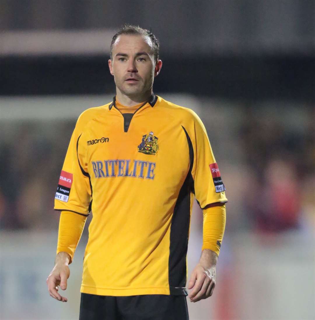 Michael Phillips, pictured during Maidstone's Isthmian League Cup final win over AFC Sudbury in 2014, has taken up a coaching role with the club's under-23s. Picture: Martin Apps