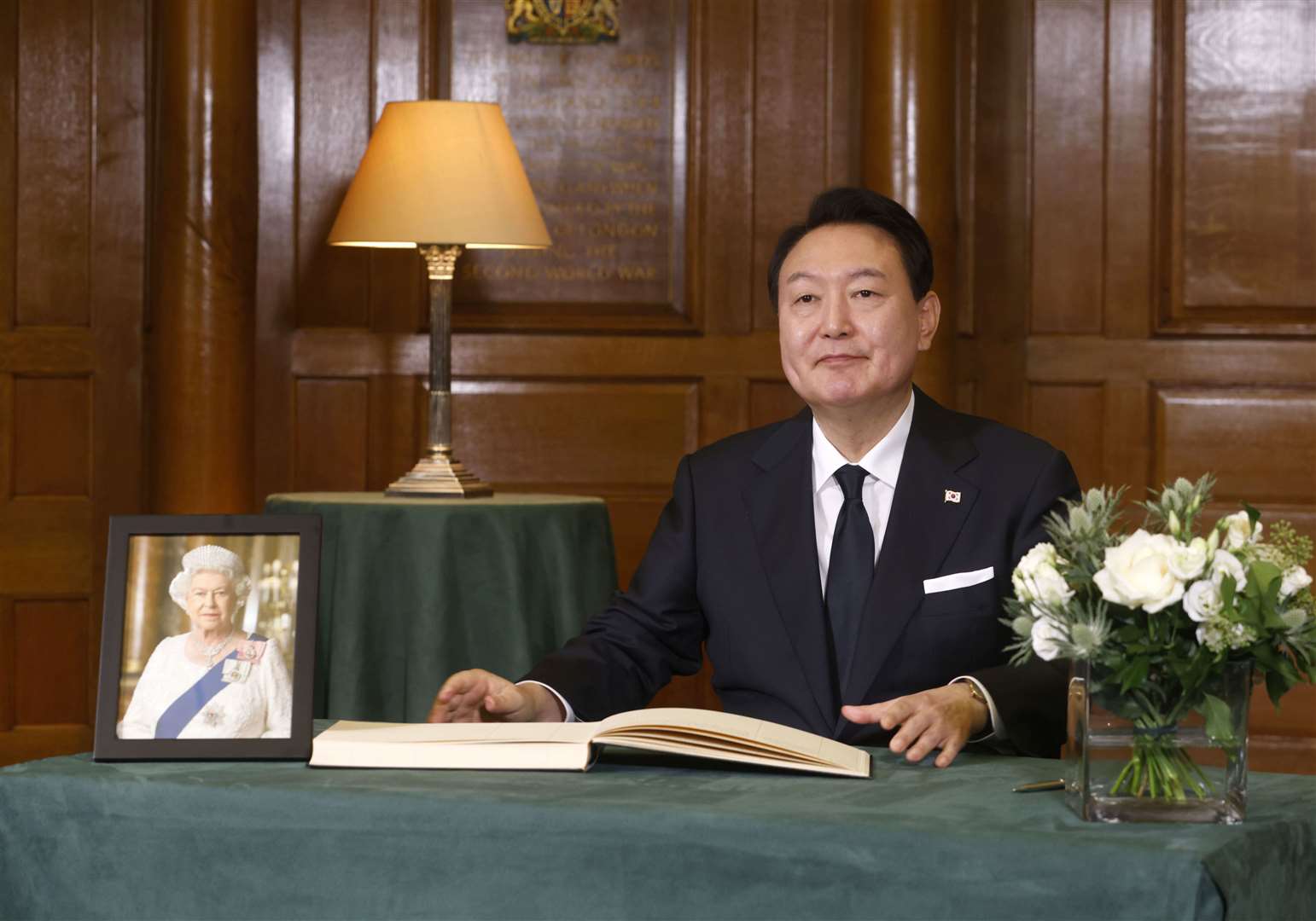 President Yoon Suk Yeol of South Korea signing a book of condolence at Church House in London following the death of Queen Elizabeth II (David Parry/PA)