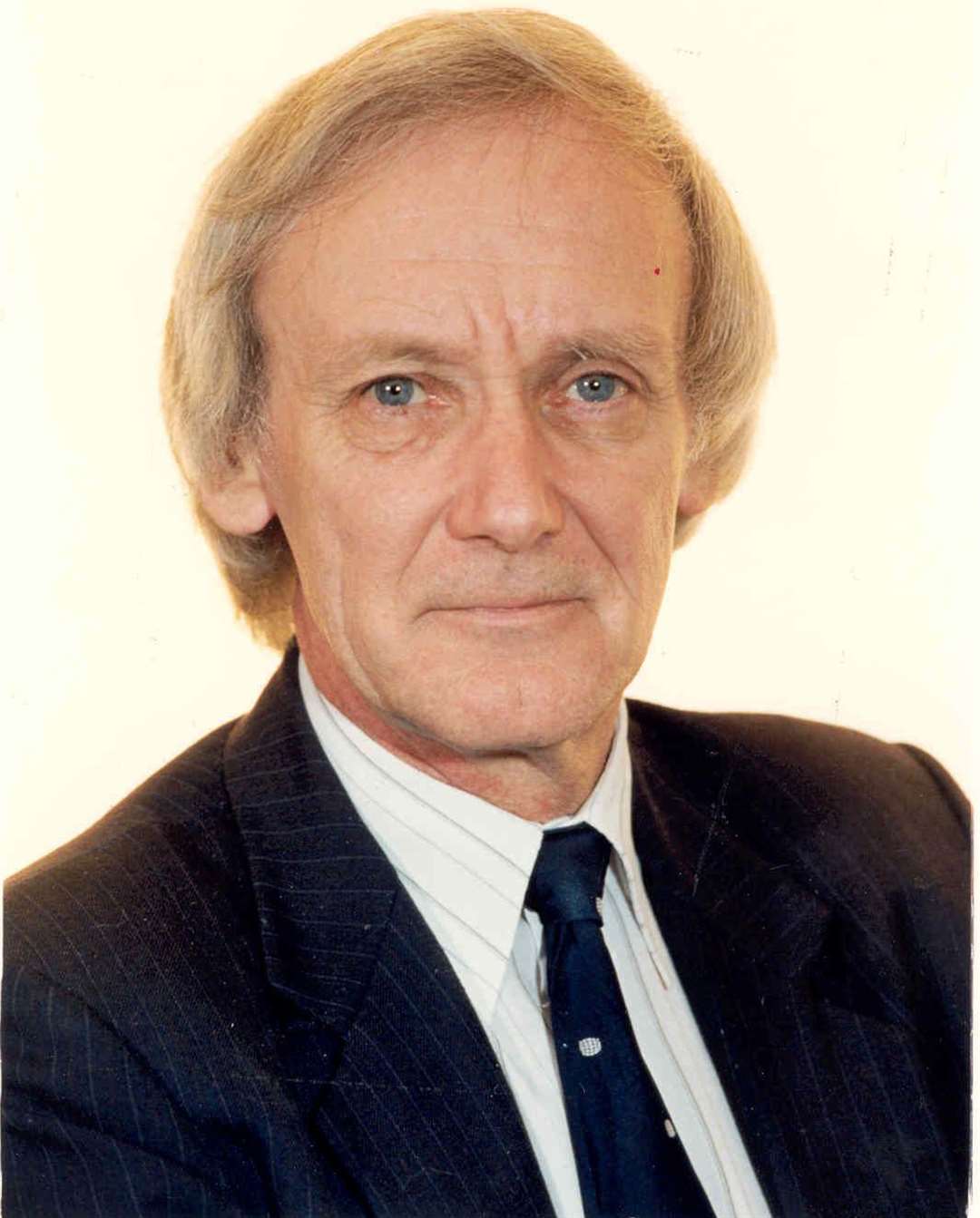Norman Smith, pictured here in 1994, became the KM Group's managing editor and the company's legal adviser after his retirement in 2000