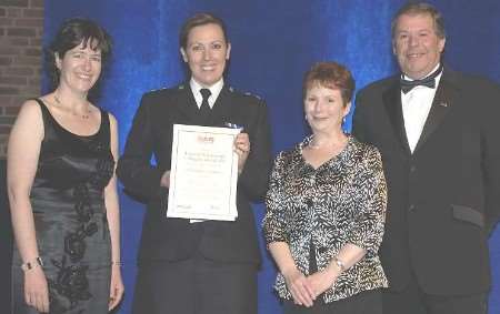 CELEBRATION TIME: from left, Catriona Marchant, editor of Jane's Police Review, DI Jacqui Luckhurst, Hazel Blears, Minister of State for Policing, Security and Community Safety, and Lifetime Achievement Award sponsor David Smith from Police Associates Register