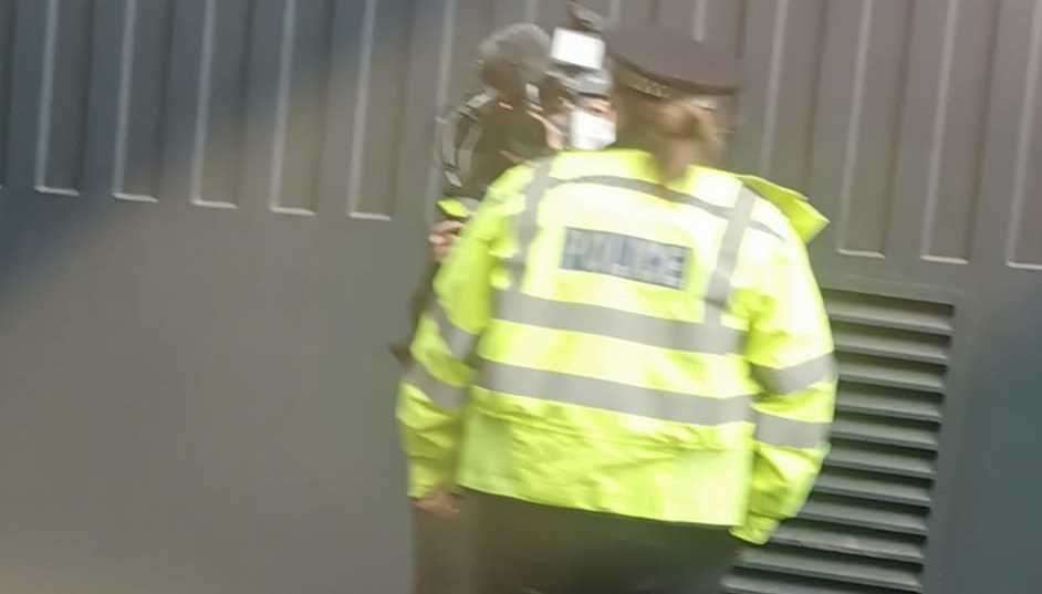 A TV crew was filming police officers at the scene. Photo: Dan Airey