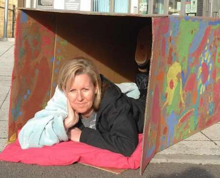 Assistant head of St Mary’s School Julia Davies in her "homeless" box, decorated by her pupils