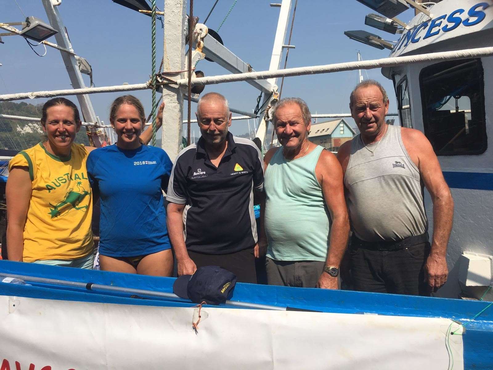 Rick Seirer (centre) with his crew Melanie Holland and Chloe McCardel (left) and Reg and Ray Brickell (right) (15941177)