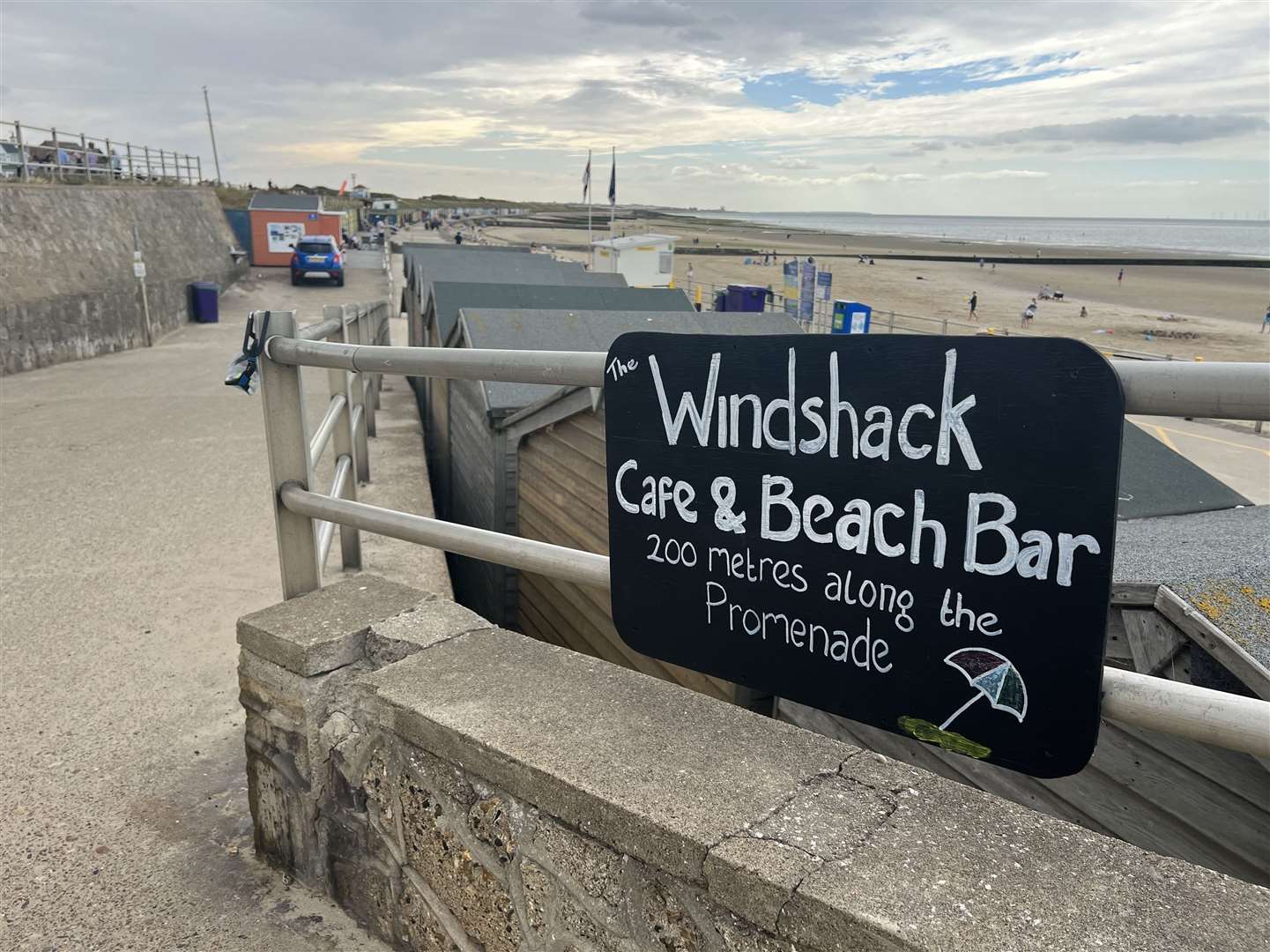 Head down onto the promenade and nestled behind the beach huts is The Windshack