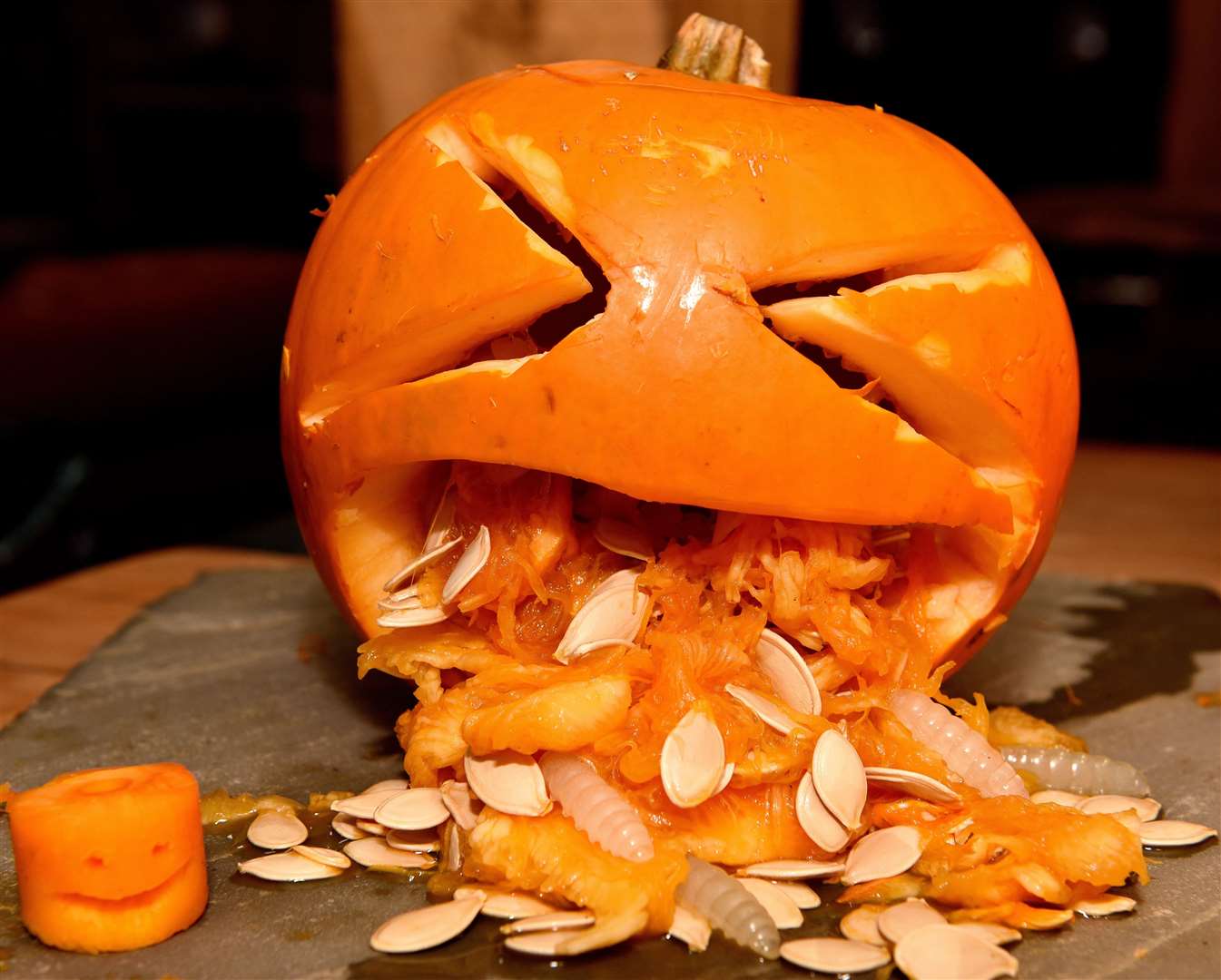 Take out the pumpkin seeds and flesh and leave a dry cavity if you want your carving to last