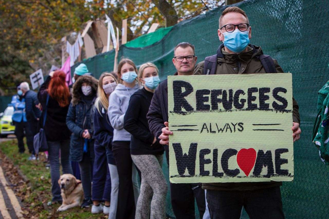 Kent Refugee Action Network spread their message at Napier Barracks in October 2020 in Folkestone Picture: Andrew Aitchison