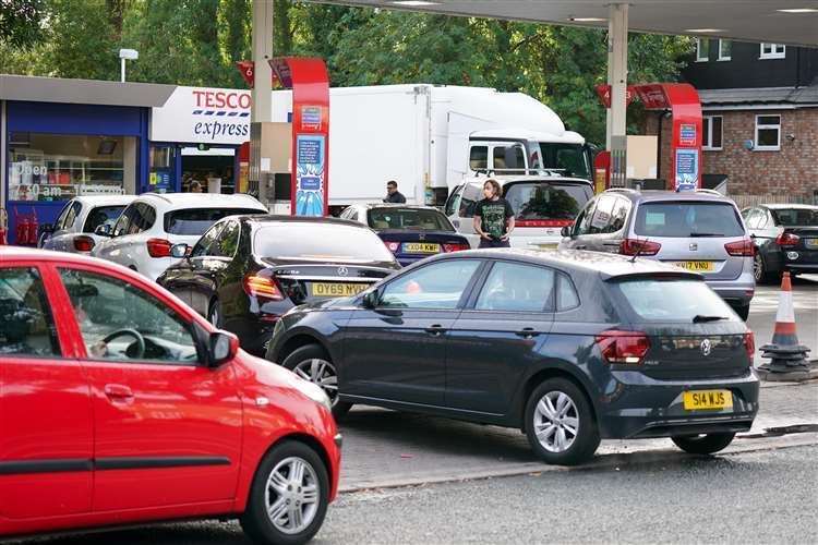 Drivers queue for fuel at an Esso petrol station in Bournville, Birmingham. Picture: Jacob King/PA