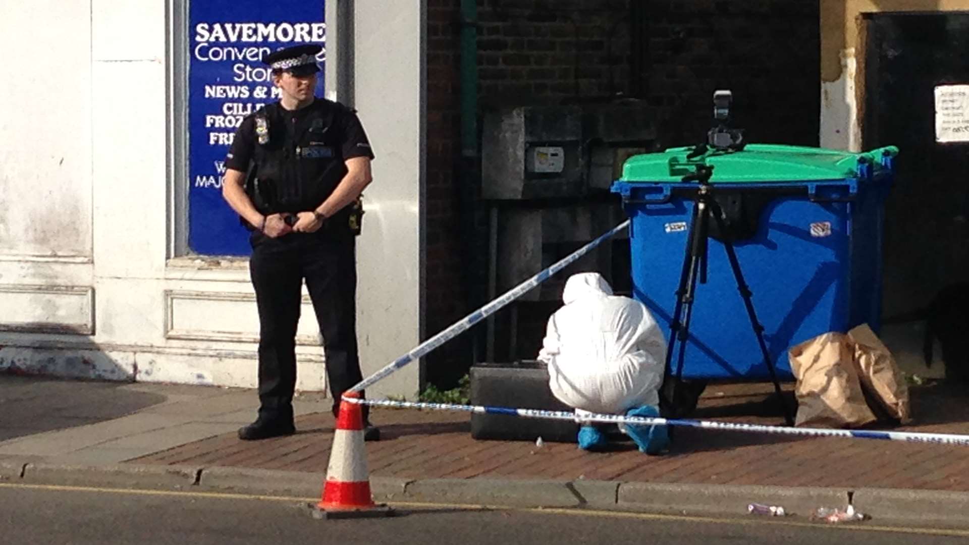 Police and forensics officers at the scene of a serious assault at The Hill, Northfleet