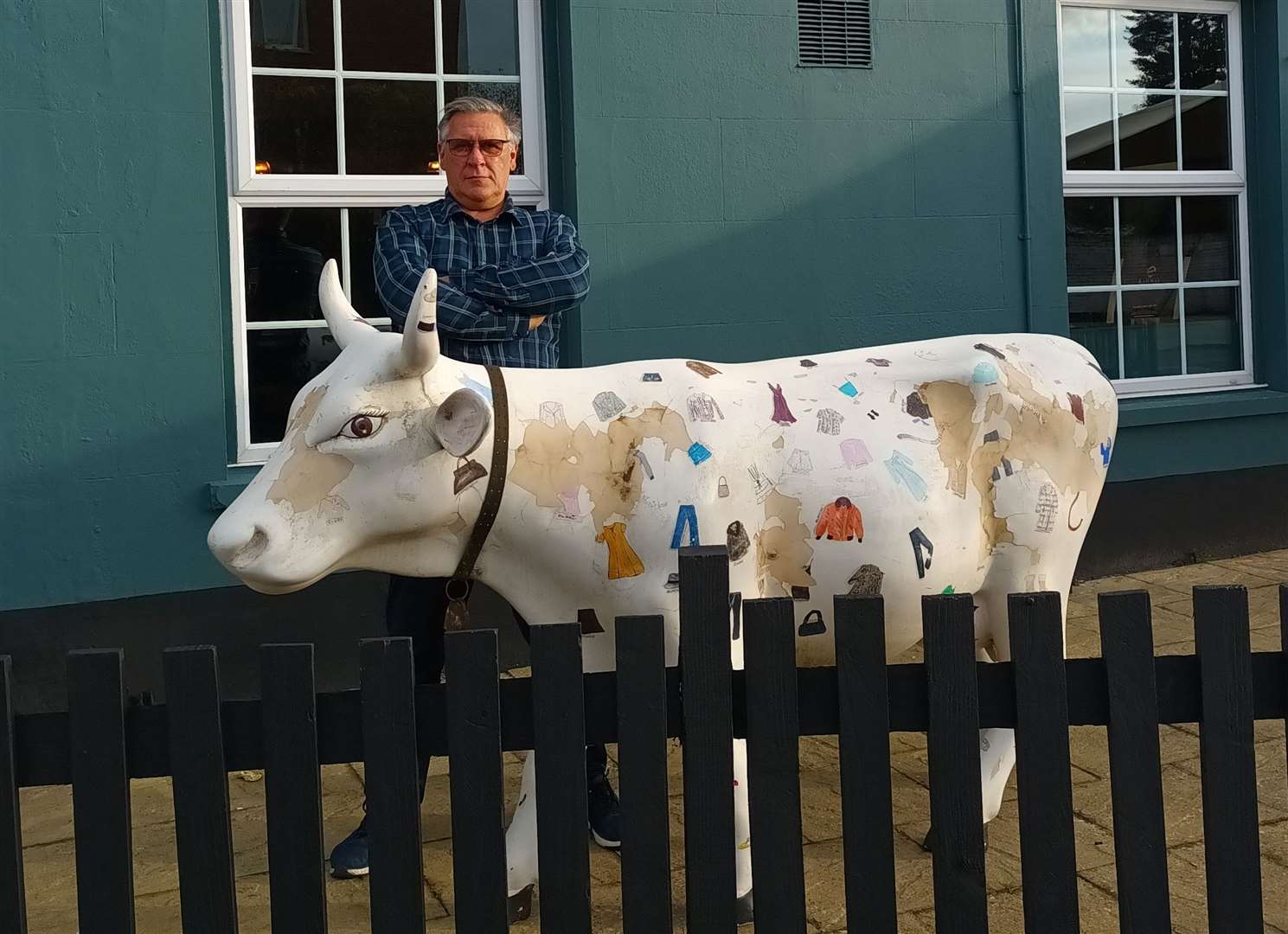 Brad Read, landlord of the Railway Tavern in Longfield, with the lucky, or cursed, cow. Image: Brad Read