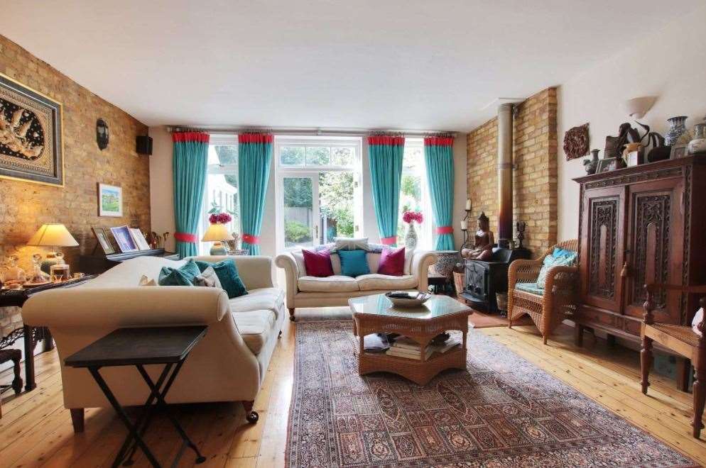Settle down in the cosy sitting room. Picture: Savills
