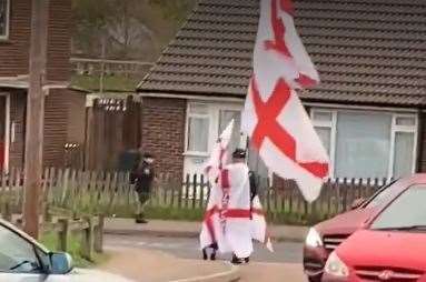 A man wearing England flags was seen walking and singing around Dartford and Swanscombe