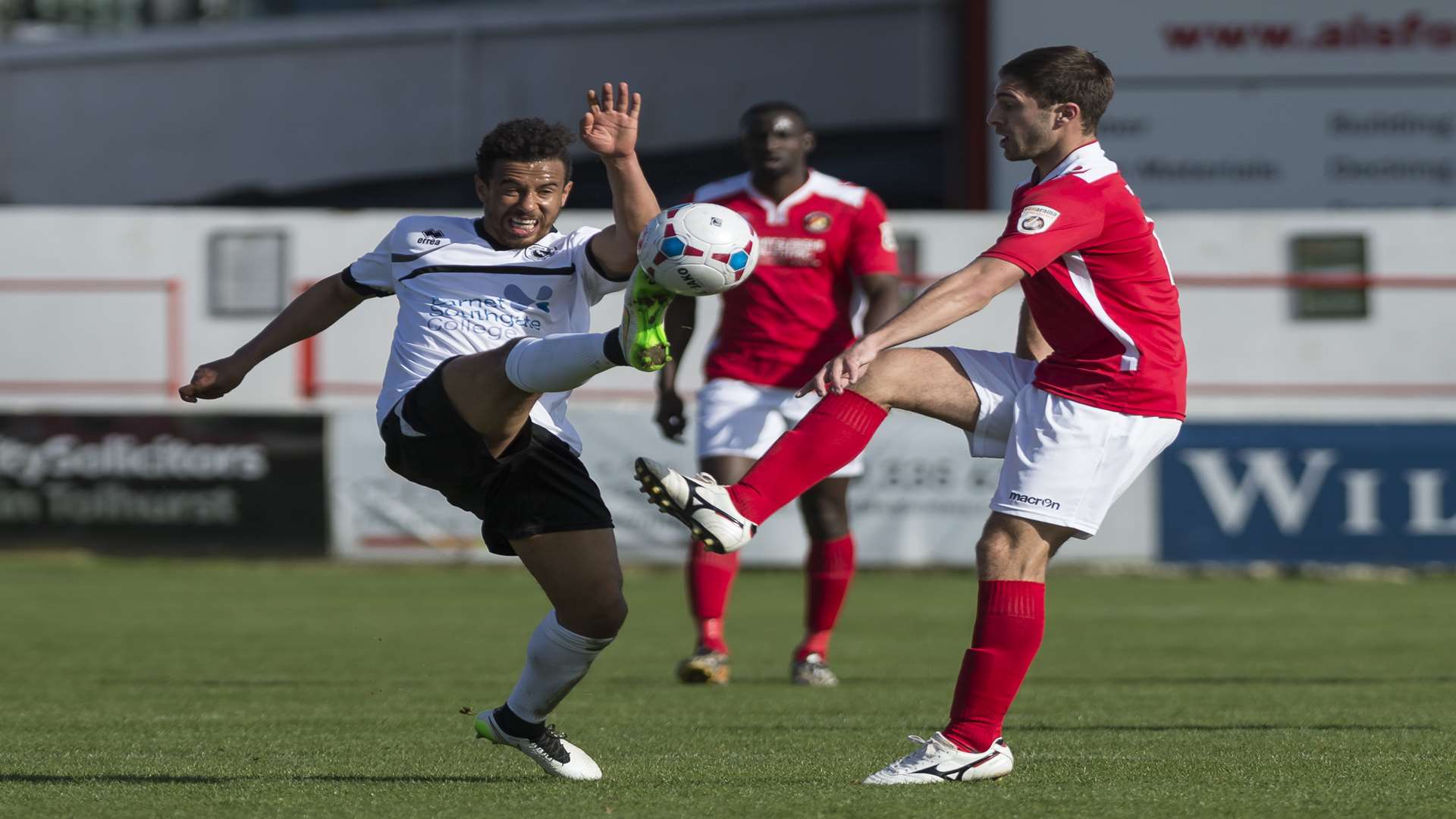 Michael West challenges for the ball against Boreham Wood Picture: Andy Payton