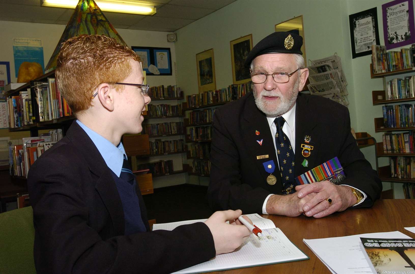 George Batts talks about the war to a pupil at St John's Catholic School in Gravesend