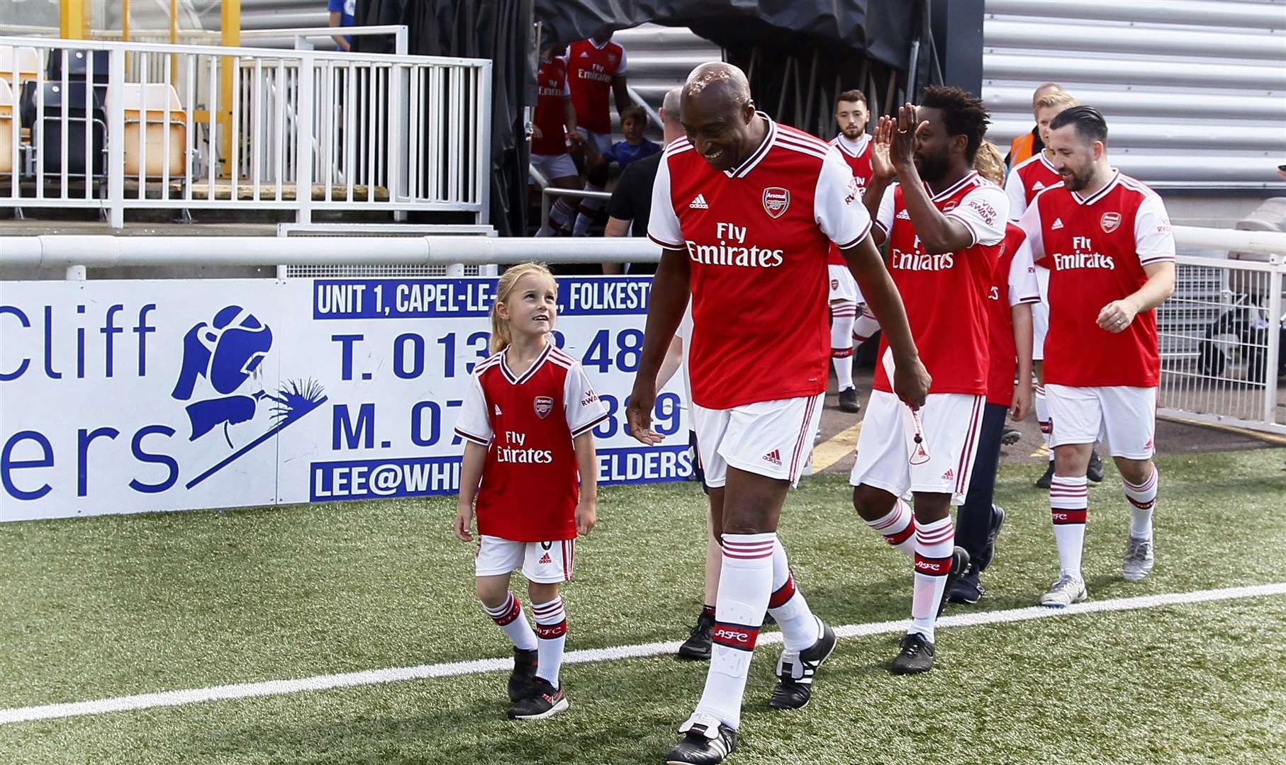 1980s footballer Chris Whyte leads out the Arsenal team at the Charity Football Match at the Gallagher Stadium Maidstone. Picture: Sean Aidan15399209)