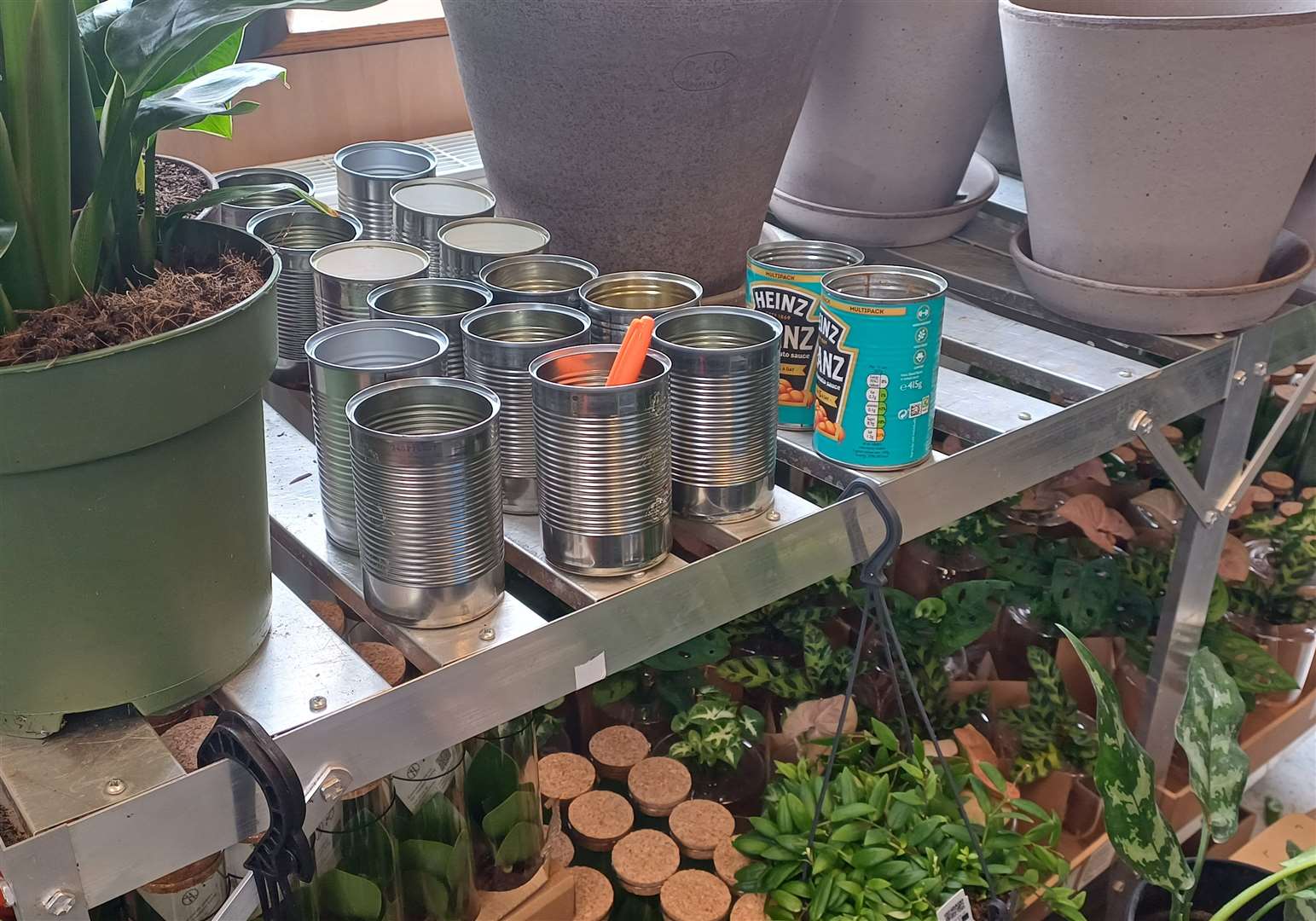 Tins, which usually contain canned food in prisons, are being incorporated into the exhibit
