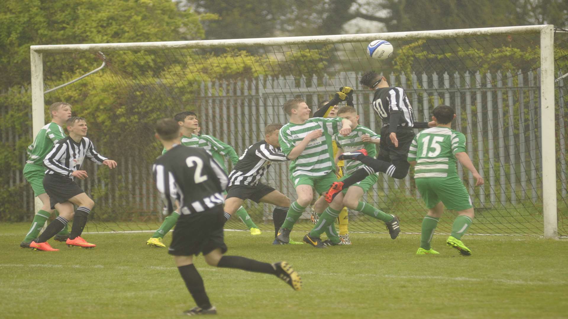 Real 60 under-15s, black and white, take on Eagles under-15s in the League Cup final. Picture: Steve Crispe