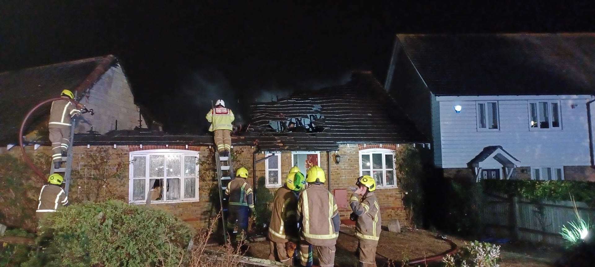 Fire crews battle the blaze at a property in Sheppey Way, Iwade