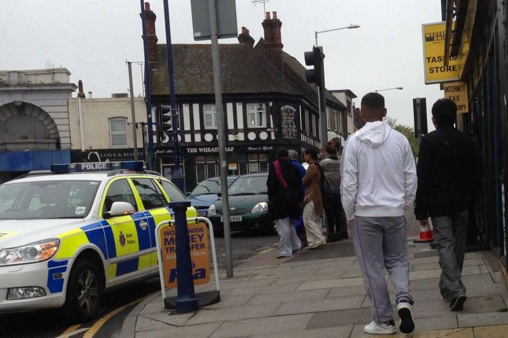 Police at the scene of an armed robbery in Gravesend