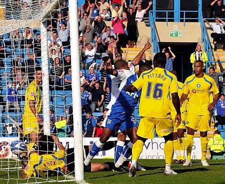 Josh Gowling scores Gillingham's opening goal. Picture: Barry Goodwin