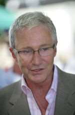 Paul O'Grady voiced his opposition to the Aldington lorry park at the opening of the school fete