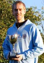 Dean Lacy with his Kent cross-country league trophy