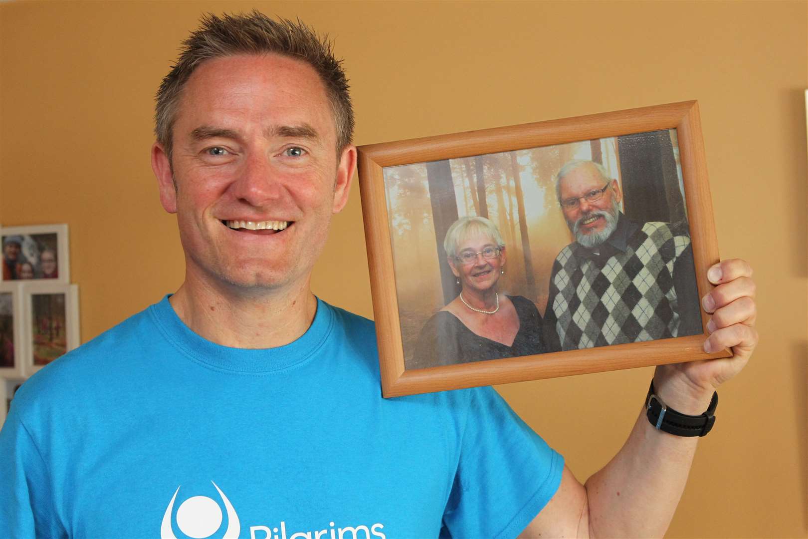 Mr Rogers is running in memory of his stepdad, Doug Chaffer, pictured