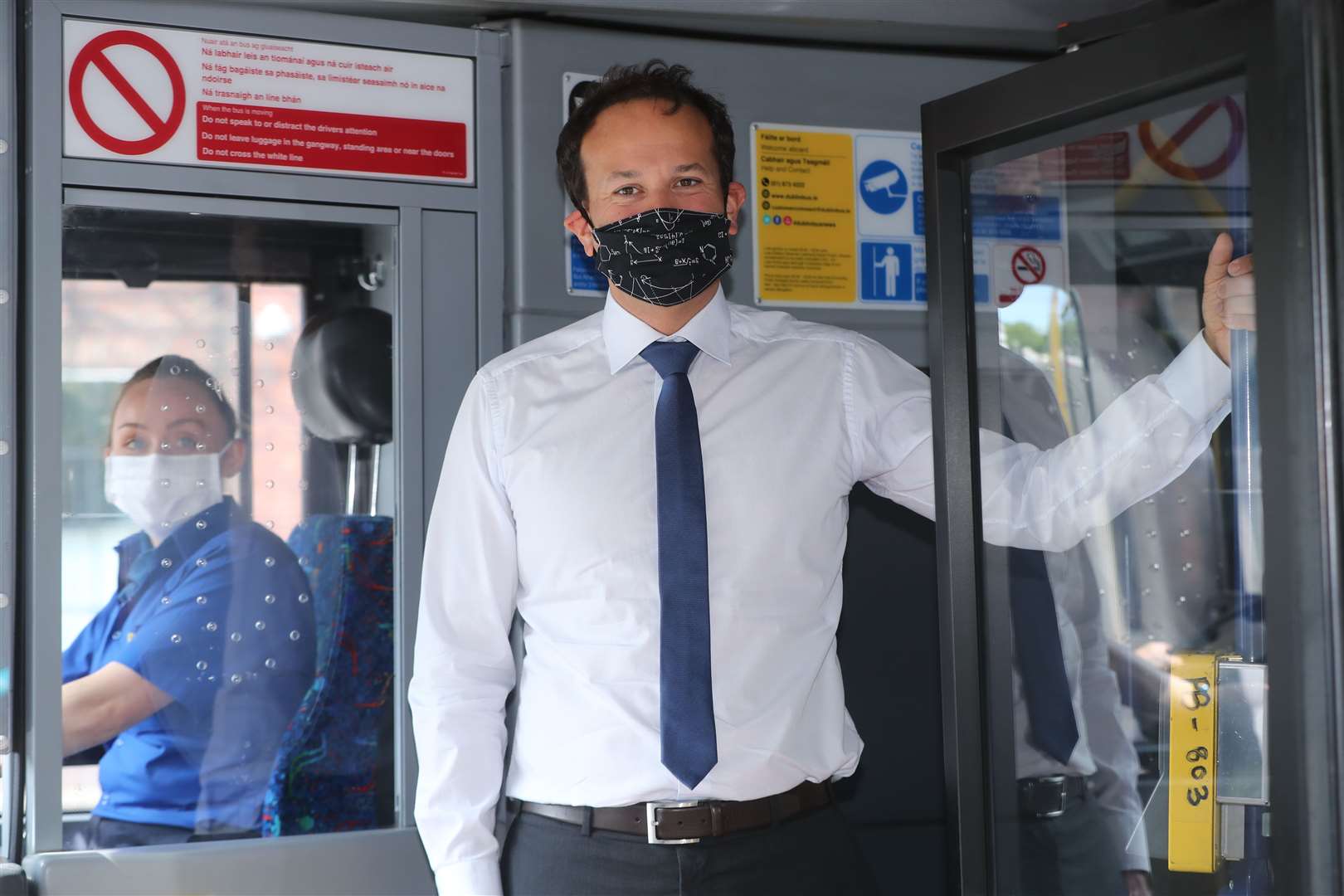 Taoiseach Leo Varadkar on a Dublin Bus in Dublin city centre, encouraging passengers to wear face masks on public transport in Ireland (Niall Carson/PA)