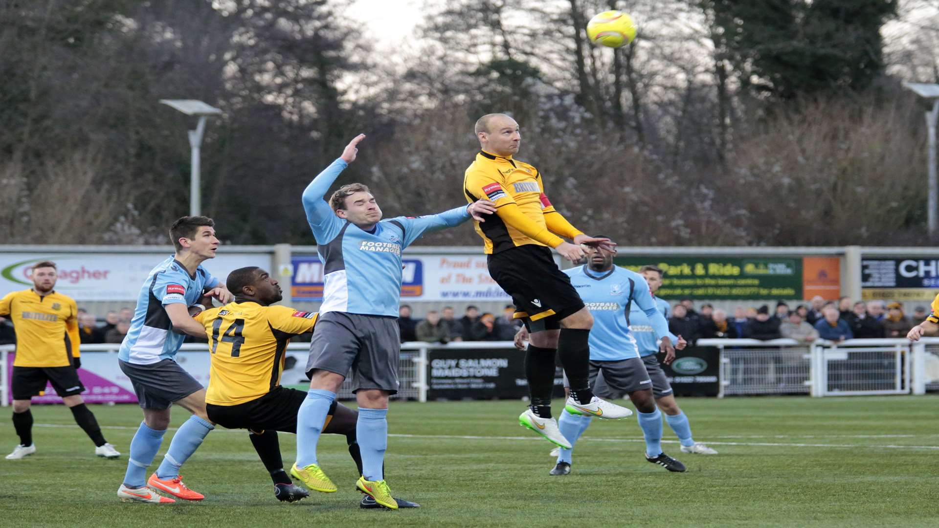 Steve Watt gets up to win this header against Enfield Picture: Martin Apps