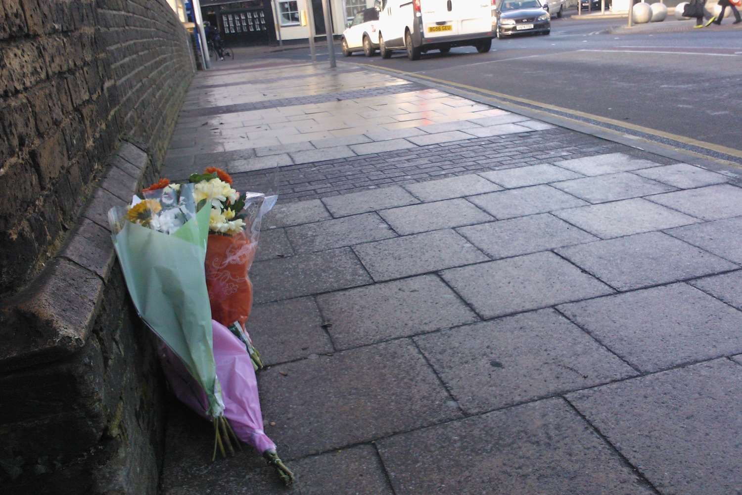 Flowers were left at the scene in the aftermath