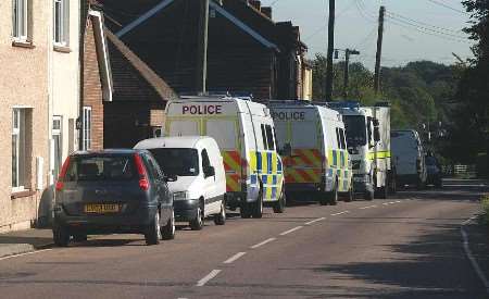 A large number of police officers were involved the operation near Sittingbourne. Picture: BARRY CRAYFORD