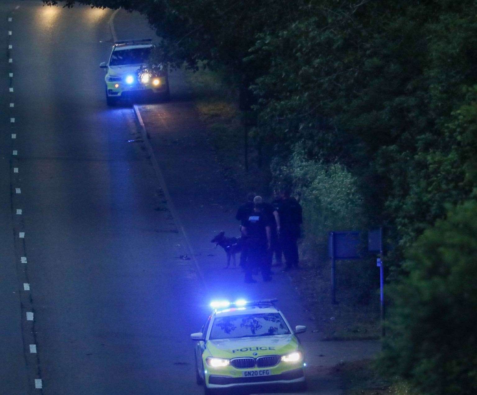 Police were seen at Chattenden near the Four Elms roundabout in the early hours searching woodland with sniffer dog teams. Picture: UKNIP