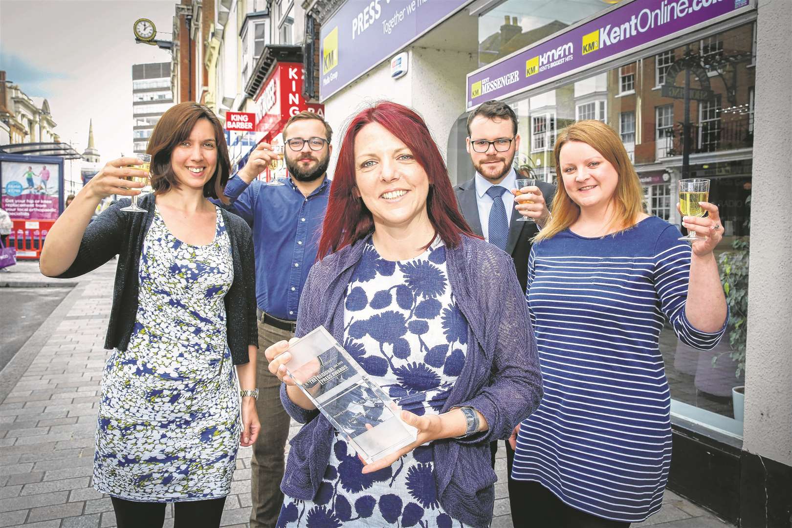 Kent Messenger editor Denise Eaton with editorial staff outside the KM offices in Maidstone with their Newspaper of the Year Award.