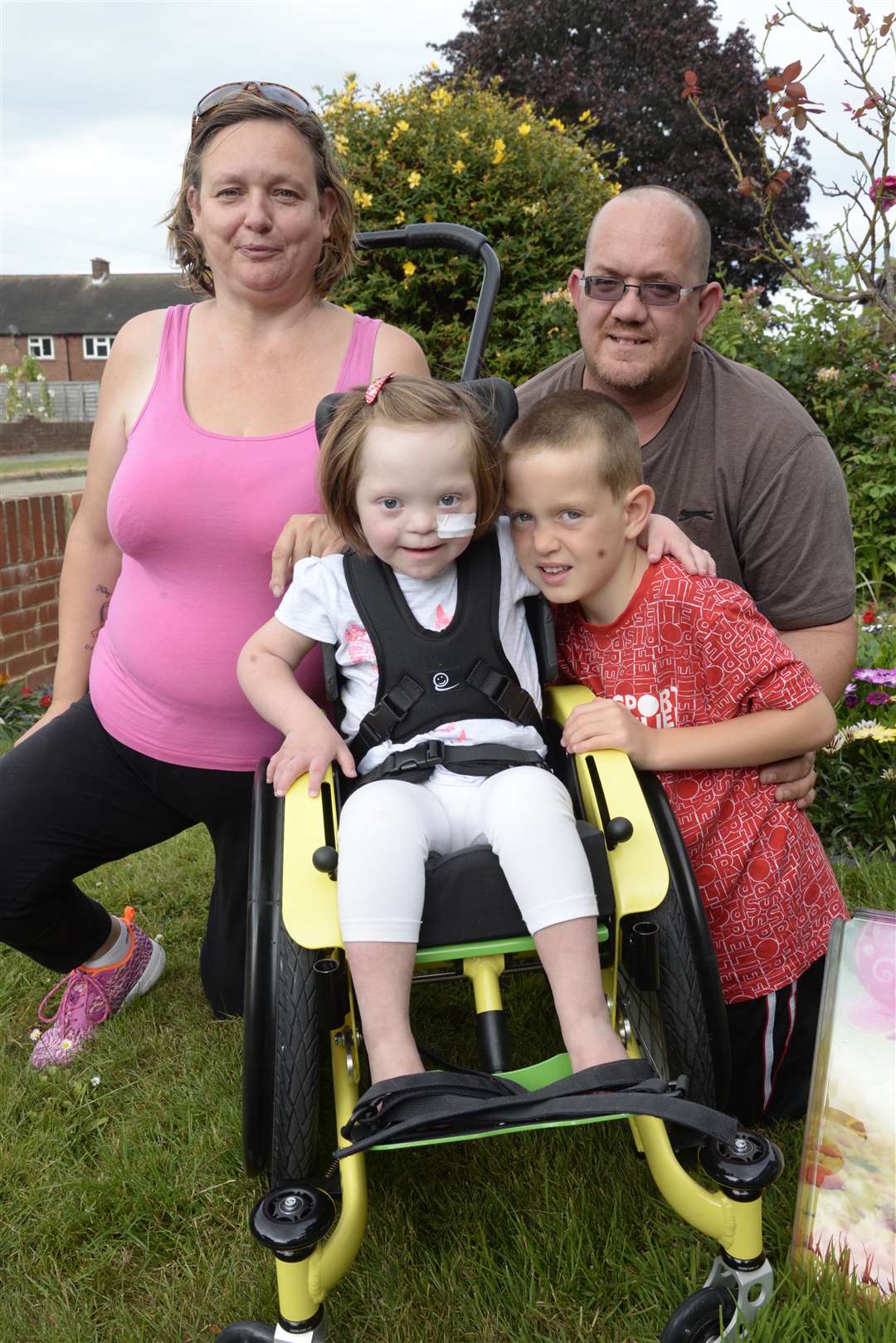 Joanne , Kevin and Harley Punyer with Kelsey-Rose Punyer of Birdwood Avenue, Deal in her new wheelchair
