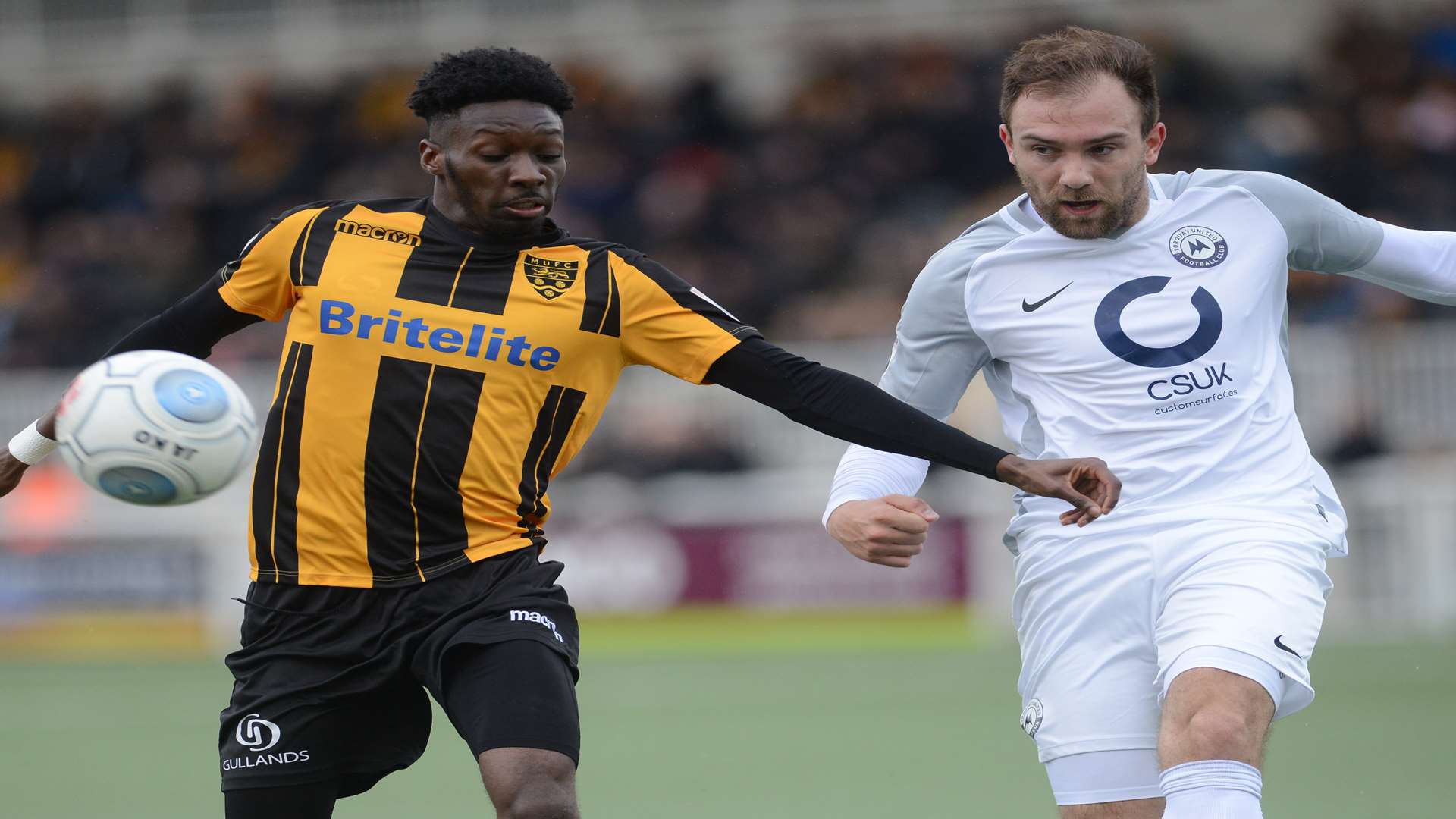 Blair Turgott keeps his man at bay Picture: Gary Browne