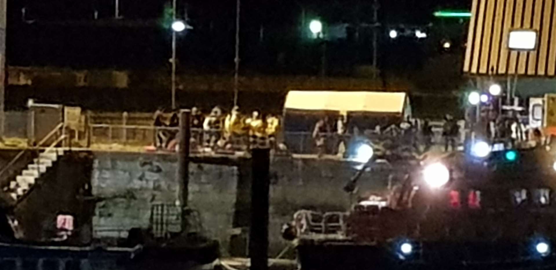 Asylum seekers rescued from the capsized boat last December arrived at Dover. Picture: Warren Grant