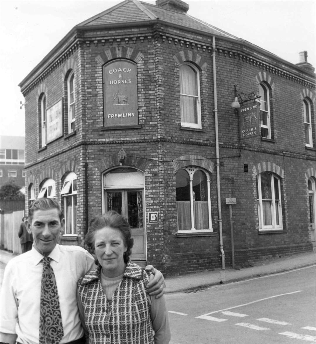 Edward and Lily Cager outside the Coach and Horses pub in Hempsted Street before it closed to make way for the construction of the Tufton Centre