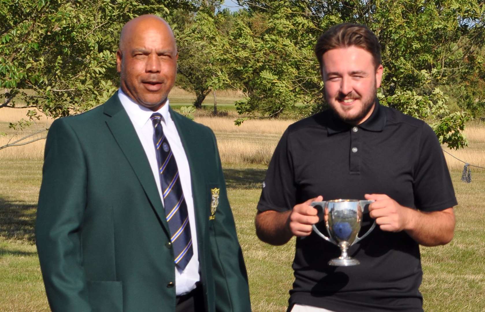 Ben Pullen is presented with the Sheerness Golf Club Championship earlier this year.