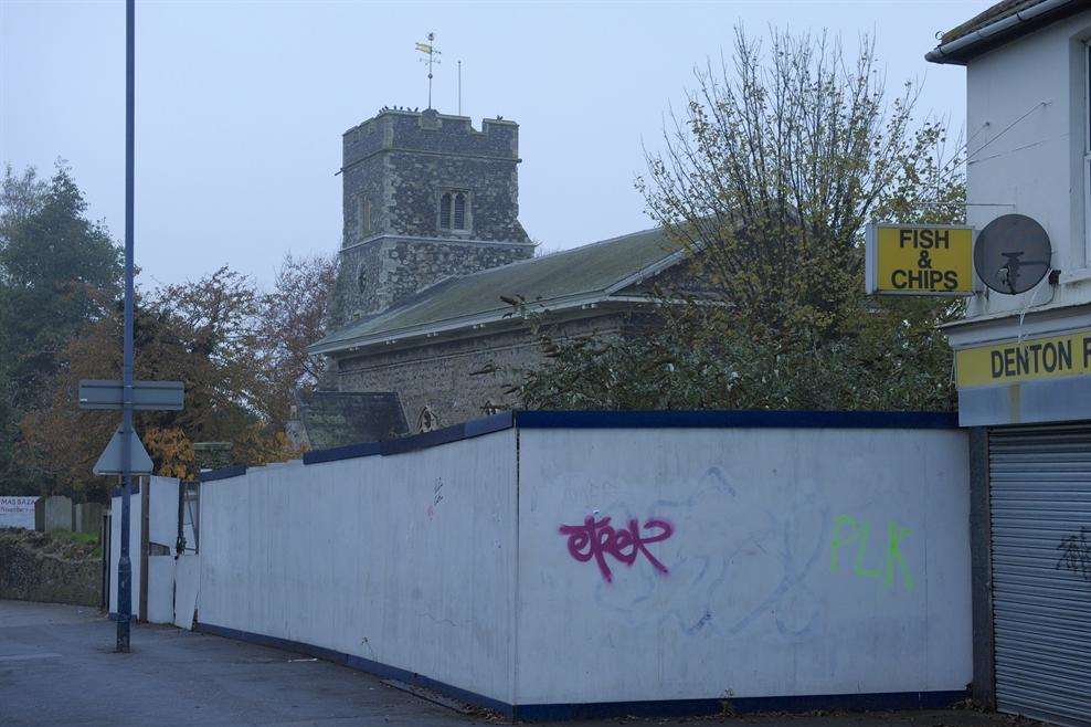Hoarding around a plot of land next to Milton church on East Milton Road, Gravesend