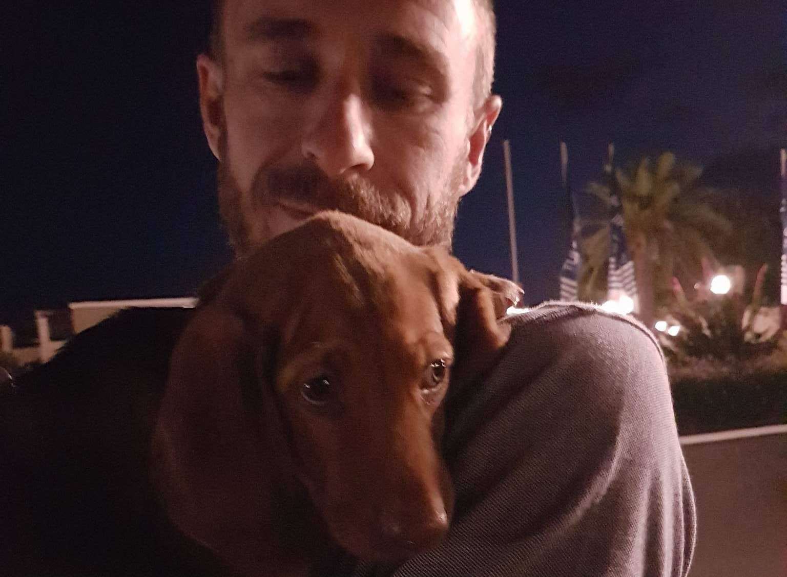 Steven with Luna, the puppy the family want to bring back from Crete
