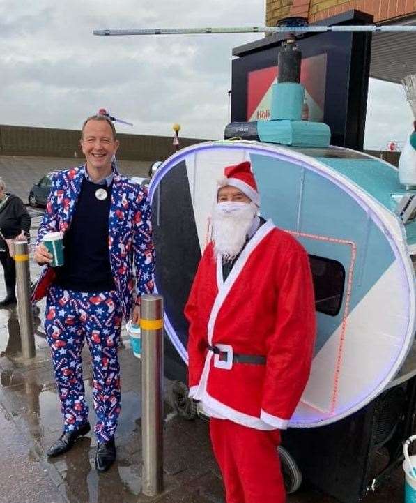 Inspiration: Sheppey pensioner Tim Bell and his 'mobile helicopter' collecting for the Kent Air Ambulance outside Sheerness Tesco with Jason Tarry