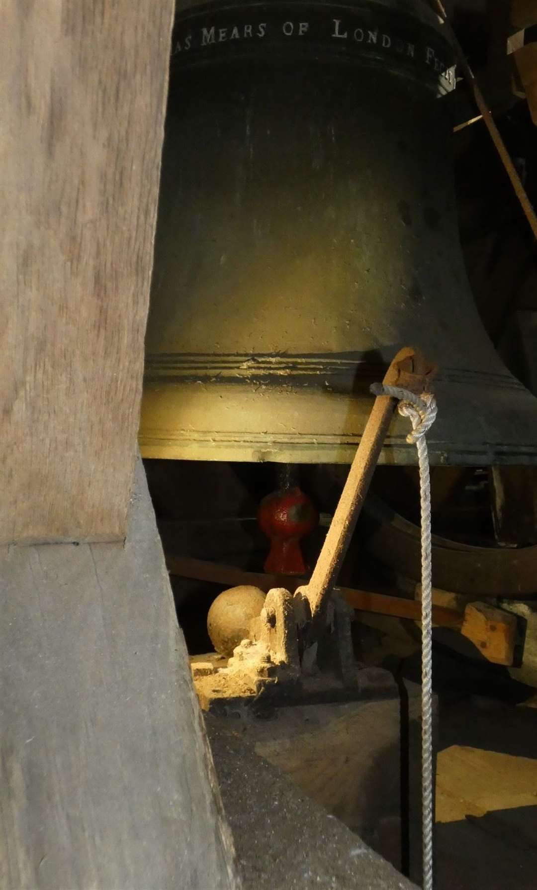 The special Ellacombe hammer, which rings the bell, is attached to the rope which goes down to the ringing frame below at Borden church. Picture: Vivien Smith