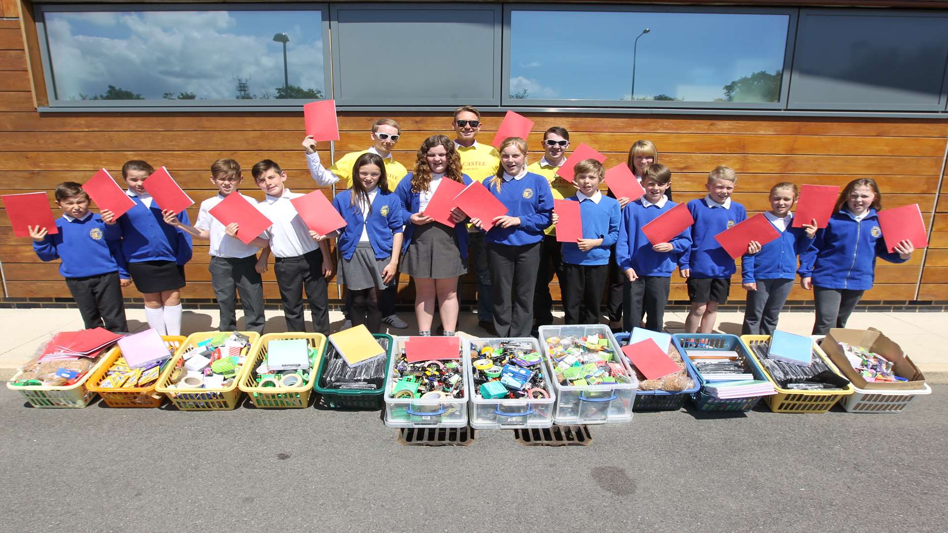 Joe Mitchell, John Brown and Liam Packer, of Coin Castle, have donated 12 boxes of stationary to Eastchurch Primary School St Clements site