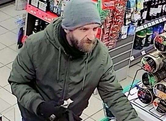 CCTV footage shows Weatherall at the BP garage till (8110526)